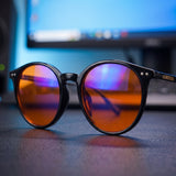 Raven Blue Light Glasses — Round Black Acetate, Amber Lenses