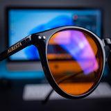 Raven Blue Light Glasses — Round Black Acetate, Amber Lenses