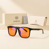 Ember black square blue light glasses with orange lenses beside the Auresta gift box, cloth and hard case