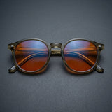 Vesper Blue Light Glasses — Round Sage Acetate, Amber Lenses